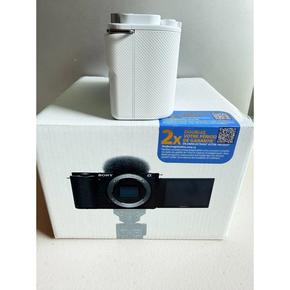 in the Box w/accessories Sony Alpha ZV-E10 Mirrorless Camera, White (Body Only)
